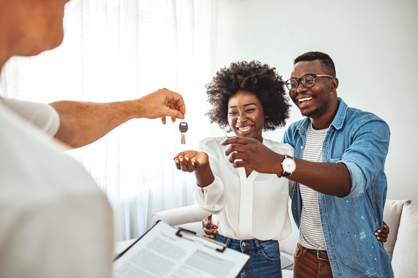 Happy homebuyers with keys